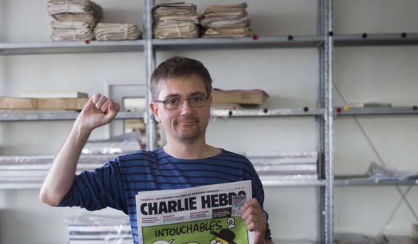 El director de "Charlie Hebdo" y otros tres dibujantes entre las víctimas fatales