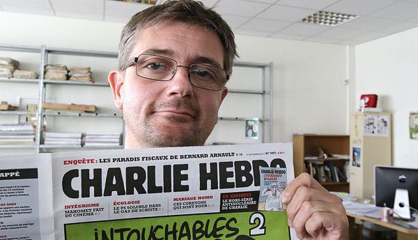 Entre lágrimas y música despiden a "Charb", el director de "Charlie Hebdo"