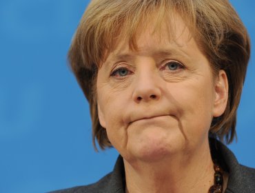 Merkel exige un alto al fuego y desarme para reunirse con Putin y Poroshenko