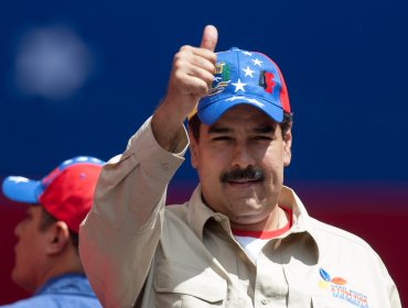 Maduro pasa página de un 2014 en recesión y promete afianzar modelo económico