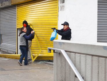 Marcha: desconocido amenazó con pistola a manifestantes y sufrió golpiza