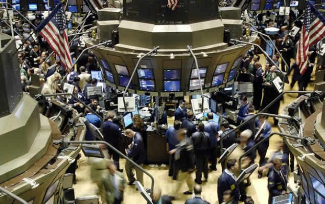 Wall Street reduce sus pérdidas iniciales a media sesión