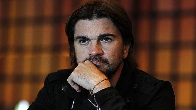 Juanes impacta en Francia con radical cambio de apariencia