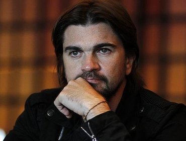 Juanes impacta en Francia con radical cambio de apariencia