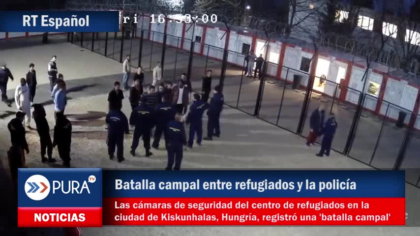 Batalla campal entre refugiados y la policía