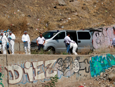 Transeúntes encuentran cadáver en camino de Huechuraba: tenía cortes en su cuello