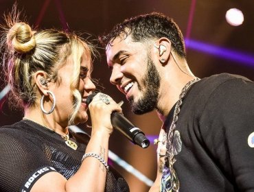 Anuel AA se tatúa el rostro de Karol G es su espalda en revelador video clip
