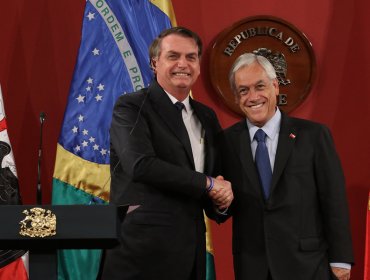 Piñera defendió a Bolsonaro en Francia, ante críticas por incendios en la Amazonía