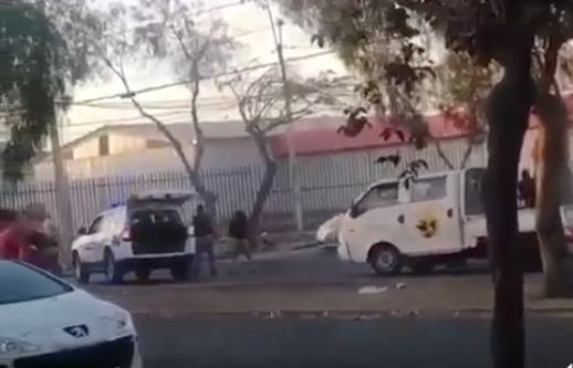 Funcionaria de la PDI fue baleada y atropellada durante saqueo a supermercado en Pudahuel
