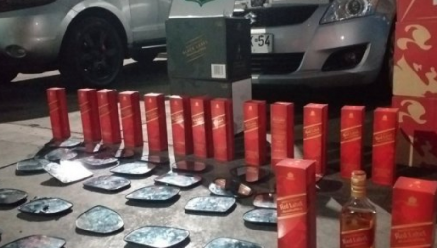 Prohíben asistir a manifestaciones a seis personas que saquearon embotelladora en Iquique