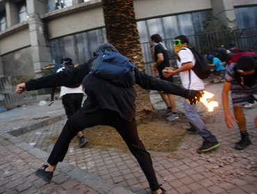 Penas de cárcel para dos sujetos por fabricar y arrojar bombas molotov en Providencia