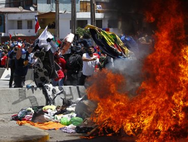Detienen a tres personas acusadas de incendiar carpas de migrantes tras marcha en Iquique