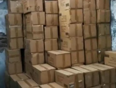 Detienen en Renca a tres sujetos que descargaban mil cajas con productos robados