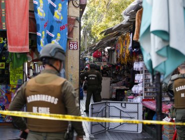 Riña entre comerciantes ambulantes en barrio Meiggs termina con un herido a bala y una carabinera golpeada