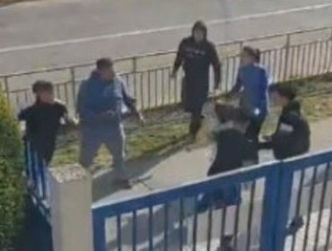 Brutal pelea en las afueras de un colegio de Puente Alto termina con dos atropellados y siete detenidos