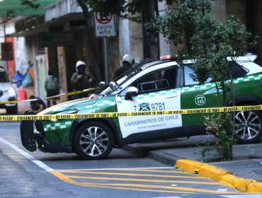 Investigan muerte de mujer hallada en el estacionamiento de un edificio en Santiago