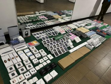 Delincuentes que robaron $120 millones en teléfonos celulares desde local en Las Condes fueron detenidos mientras escapaban